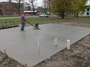 Sandy concrete pads for RV, sheds, AC, basketball